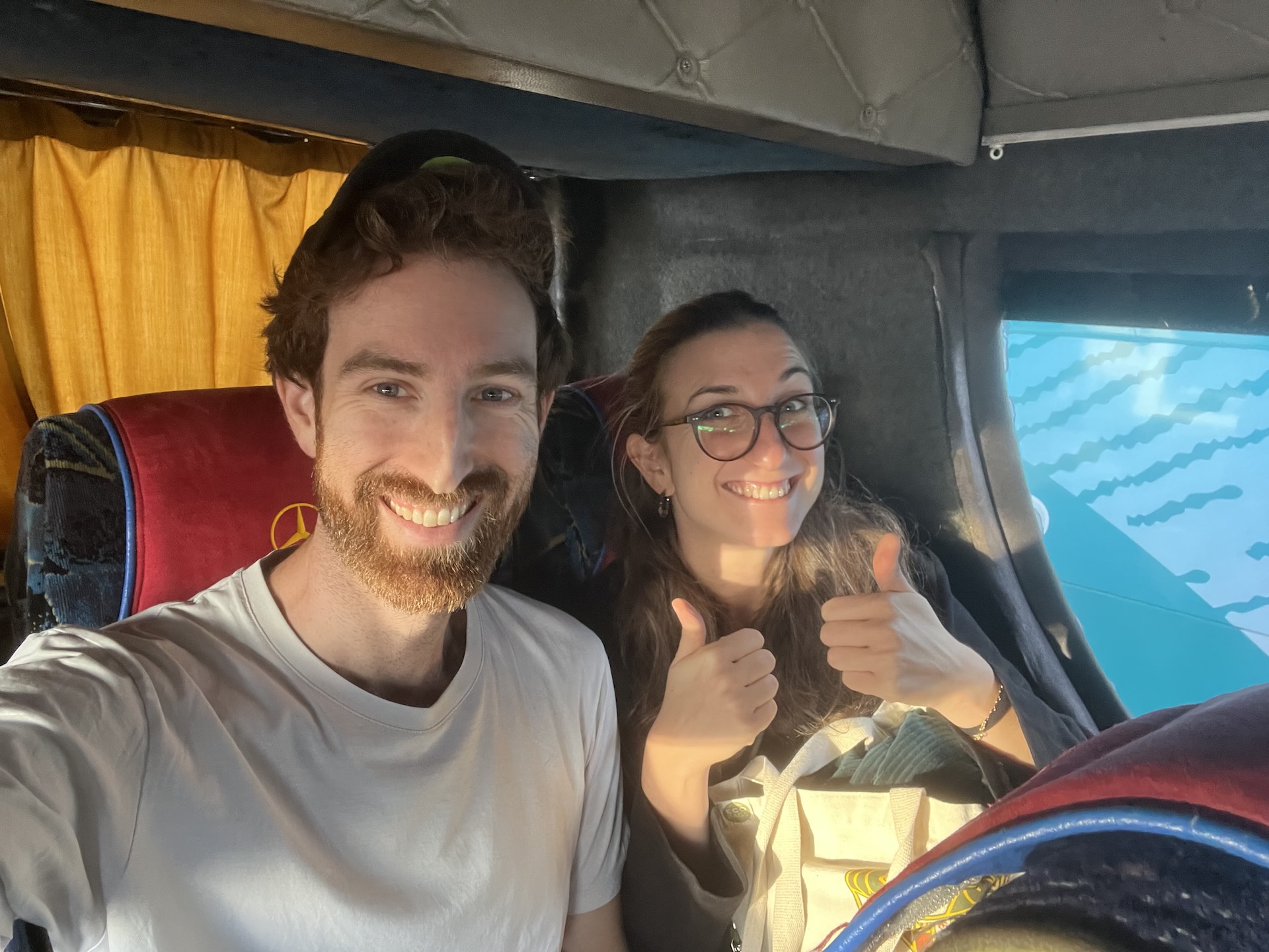 Eleonora and Aaron riding a bus from Tirana to Gjirokastër, Albania.